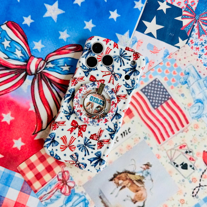 American Girly MagSafe grip ring shown beside the matching American Girly iPhone case on a patriotic stars and bows backdrop.