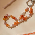 Beaded Phone Strap in Sunset Orange