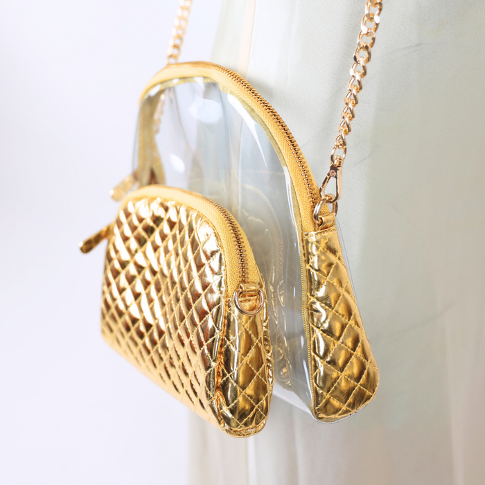 a gold purse on a white background