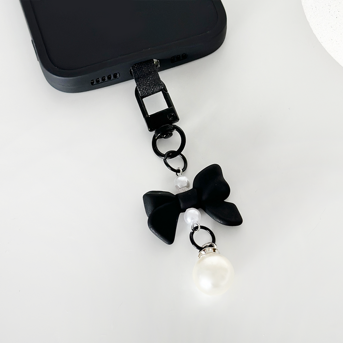 Black Coconut Lane phone keyring bundle with coquette-style bow accessory.
