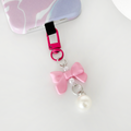 Bright pink phone case and matching bow keyring bundle from Coconut Lane.