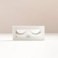 Darling lower lashes by House of Lashes in a pale blue box with a clear window and gold trim