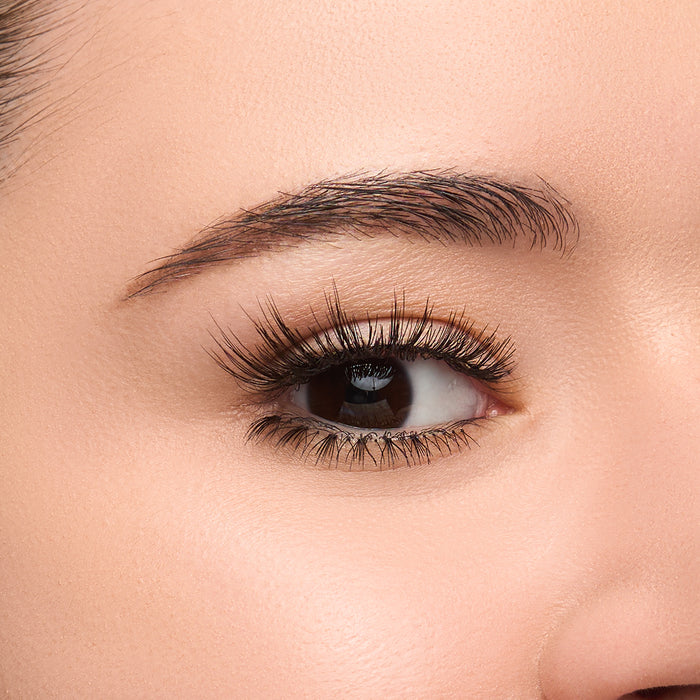 Darling lower bottom lash with natural clusters shown on an eye.
