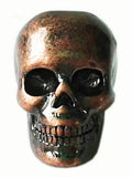 Copper skull hair bead with oxidized finish, front view