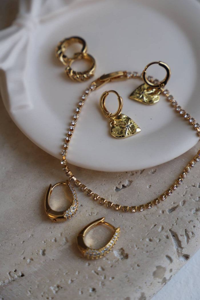E1683G Gold Earrings-Starburst Heart Huggies