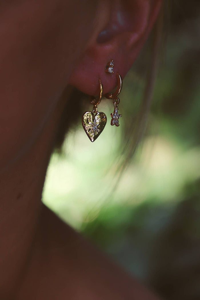 E1683G Gold Earrings-Starburst Heart Huggies