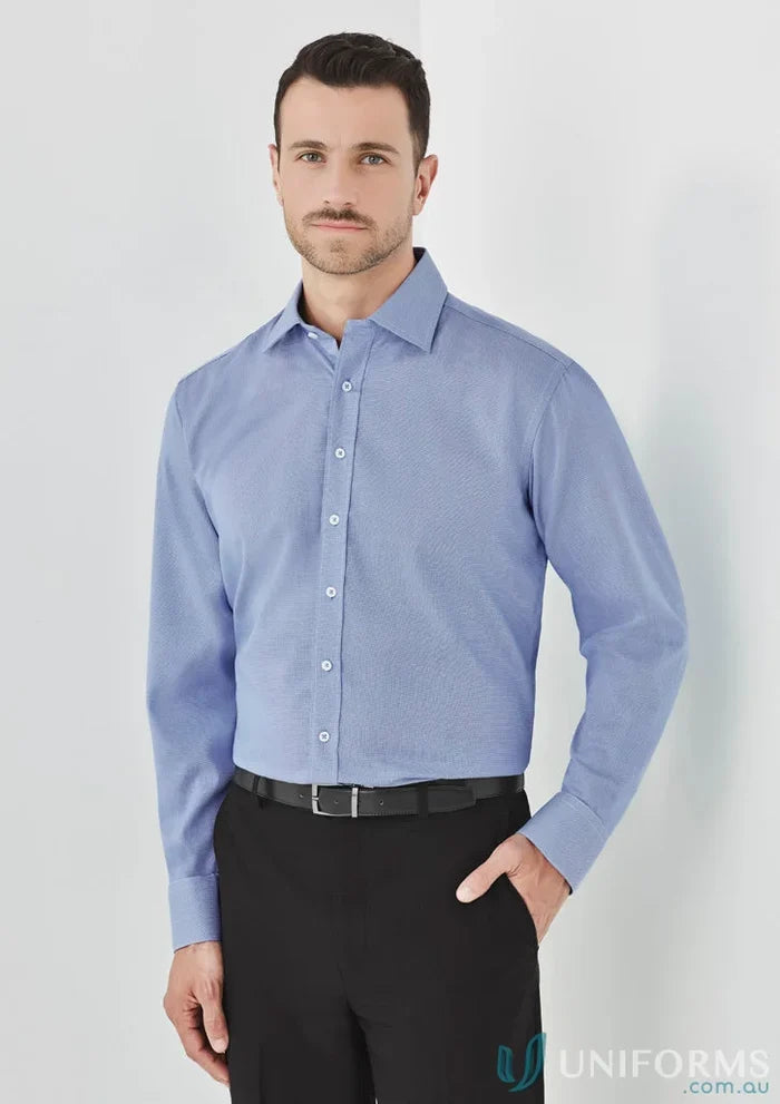 Man wearing Hudson Cotton LS Shirt in relaxed fit with blue dress shirt and black pants