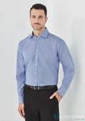 Man wearing Hudson Cotton LS Shirt in relaxed fit with blue dress shirt and black pants