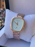 Hannah Martin rose gold cushion-case watch on white display pillow