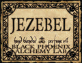 Label for 'Jezebel' hand blended perfume oil by Black Phoenix Alchemy Lab with decorative border.