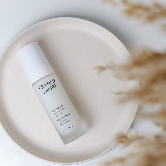 France Laure Regenerate Jouvenance Intense Serum in sleek white bottle on ceramic plate, natural skincare for all skin types