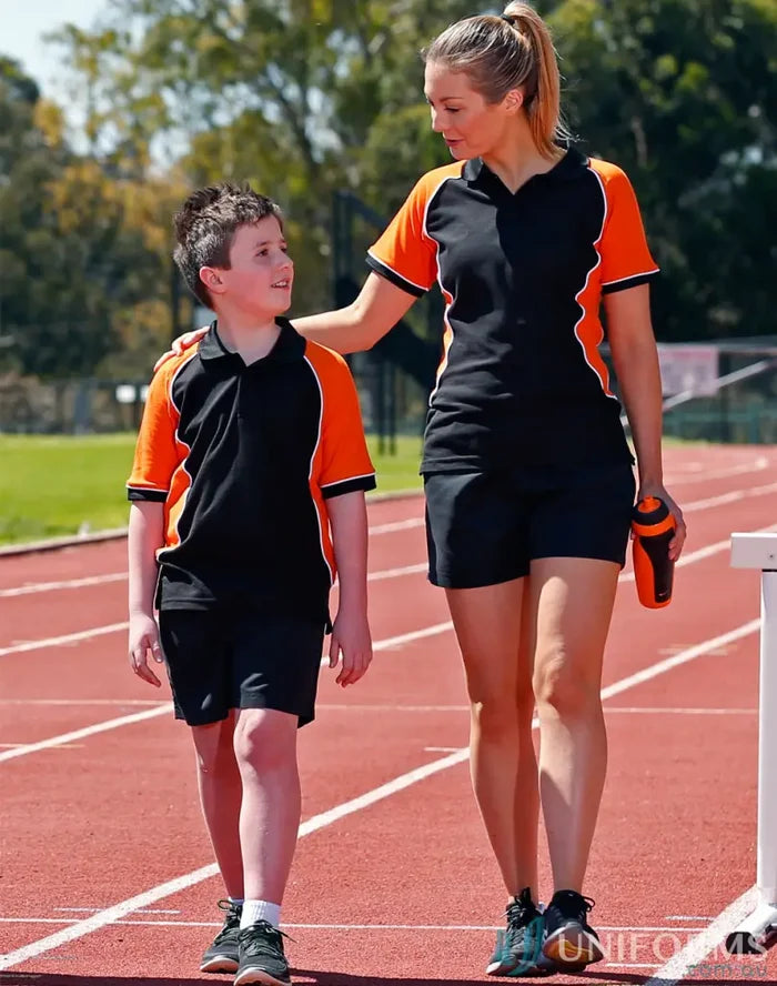 Kids Arena Polo matching black and orange athletic outfits for kids group events