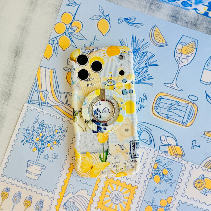 La Dolce Summer MagSafe phone grip ring with Mediterranean lemon, blueberry, blue gingham, and coastal travel lifestyle collage pattern compatible with iPhone and Samsung