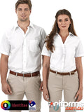 Two ladies wearing rodeo workwear shirts and khaki uniforms for a casual look