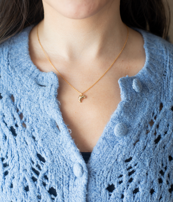 maman le croissant necklace worn around neck