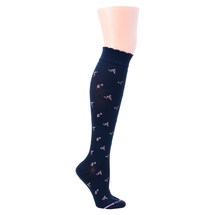 Knee-high compression socks in navy with a floral pattern and scalloped top.