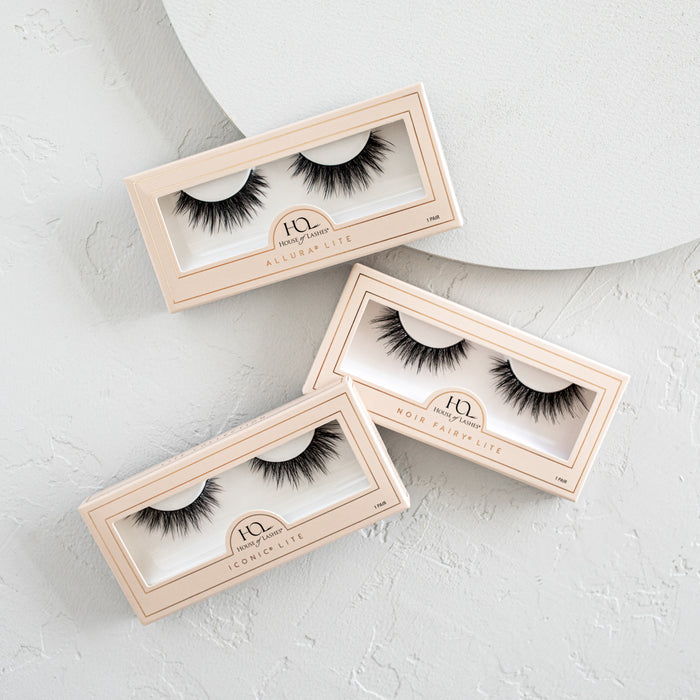 Lite Collection Custom 3-Pack with three peach boxes of lashes displayed on a pale surface.