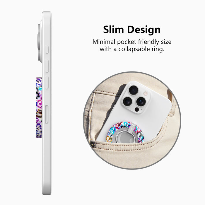 Love Out Loud colorful graffiti heart pattern MagSafe phone grip ring with overlapping neon pink purple and turquoise hearts compatible with iPhone and Samsung