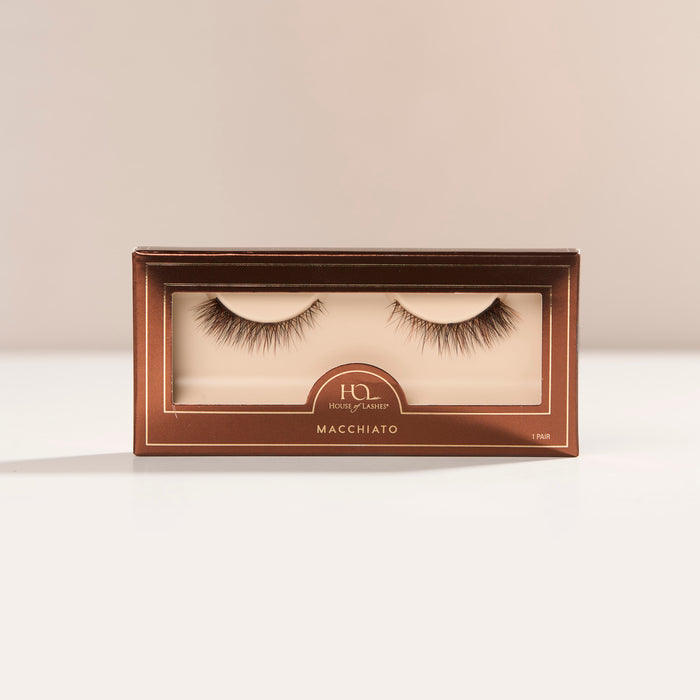 Macchiato a short natural lash with denser outer corners and wispy texture for an everyday look, featuring a unique blend of black, brown, and red wine fibers for natural dimension.