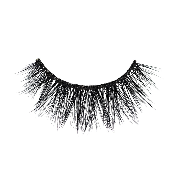 Close up of a black woven curved necklace with fringe against a white background