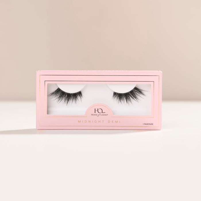 Midnight Demi a dramatically flared half lash with extra-long length, bold volume, and textured spiky clusters creating a 4D effect.