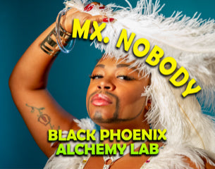 Person in a white fur headdress with 'MX. NOBODY' text and 'Black Phoenix Alchemy Lab' branding.