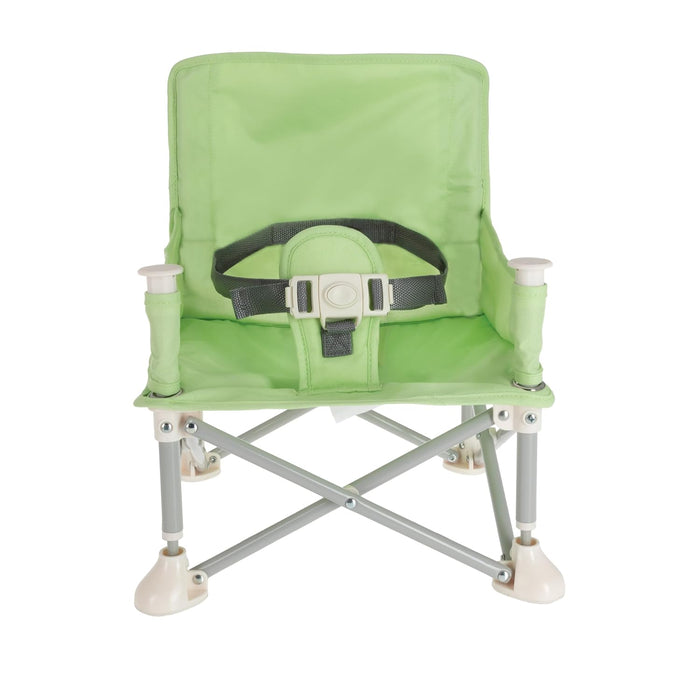 The Nuby Pop Up Booster Seat | Green is a portable folding chair for young children, featuring a safety harness and white plastic feet.