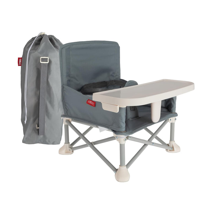 The Nuby Pop Up Booster Seat | Grey features folding legs, a detachable tray, safety straps, and comes with a matching carrying bag—ideal for travel with young children.