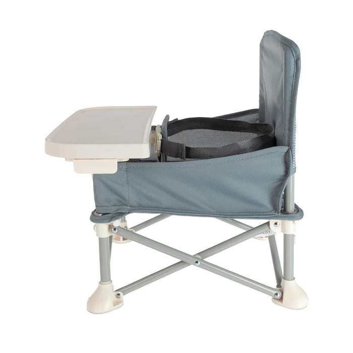 The Nuby Pop Up Booster Seat | Grey features a foldable tray, safety straps, and sturdy metal legs—making it an ideal portable travel booster for toddlers or young kids to sit comfortably at the table.