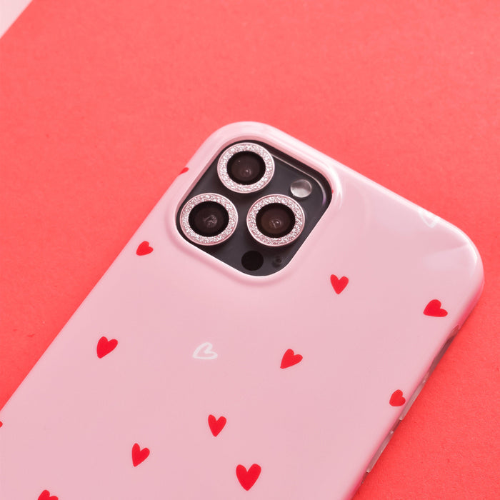 Pink glitter camera lens covers with a sparkly finish from Coconut Lane, designed for full protective coverage.
