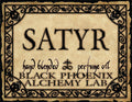 Label for 'Satyr' hand blended perfume oil by Black Phoenix Alchemy Lab with decorative border and text.