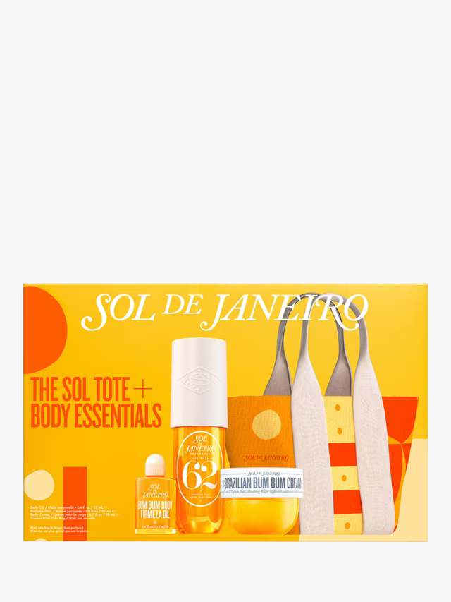Sol de Janeiro Sol Tote with body essentials, including body lotion and skincare products, arranged in a stylish gift set.