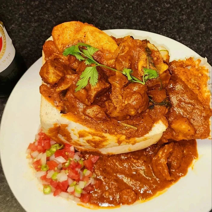 Taste of Africa Durban Mutton Bunny Chow spice mix packet with recipe for authentic South African curry served in bread