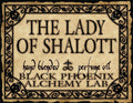 Label for 'The Lady of Shalott' perfume oil by Black Phoenix Alchemy Lab with decorative border.
