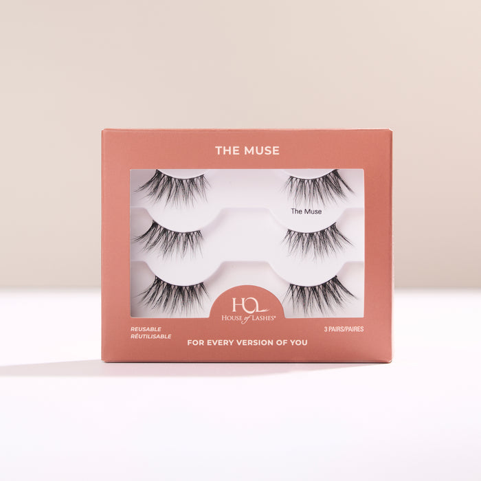 The Muse Half Lash box in peach packaging with three lash pairs visible through the window.