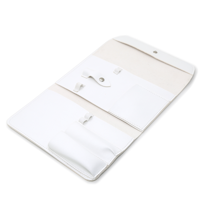 White manicure tool case unrolled with pockets, tools not included