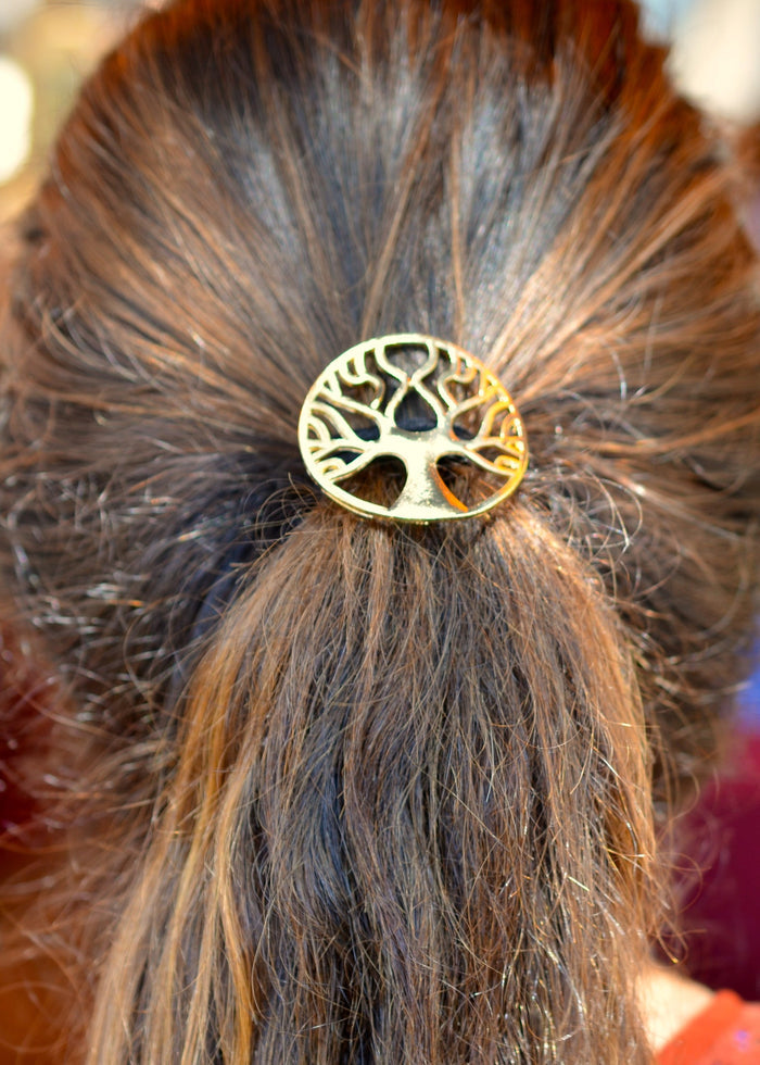 Model wearing Tree of Life Hair Hook - Gold Celtic Ponytail Holder for Women