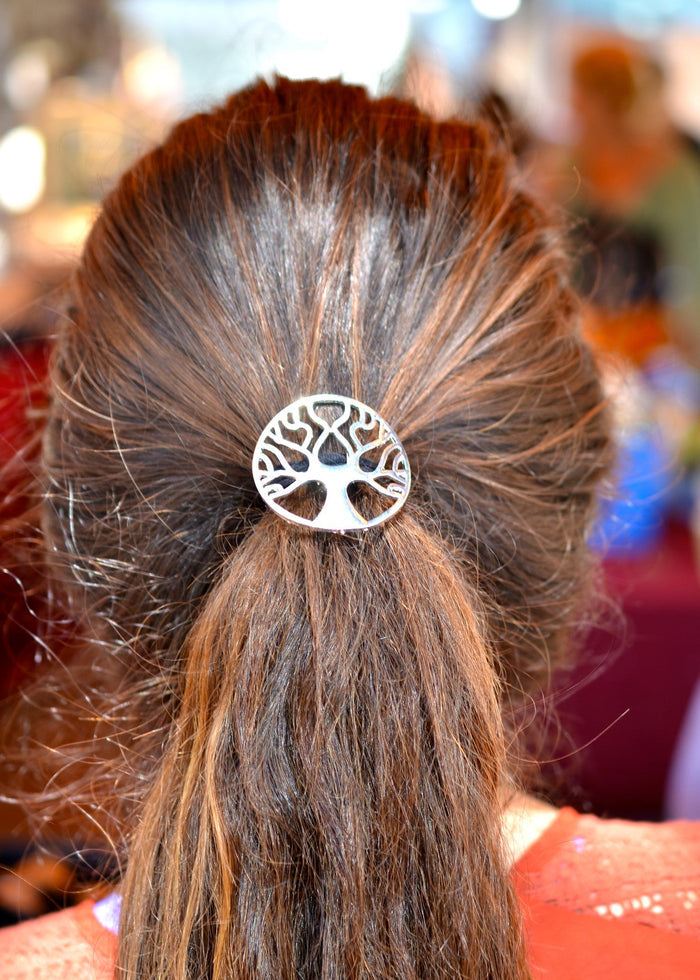 Model wearing Tree of Life silver hair hook Celtic boho ponytail holder, back view