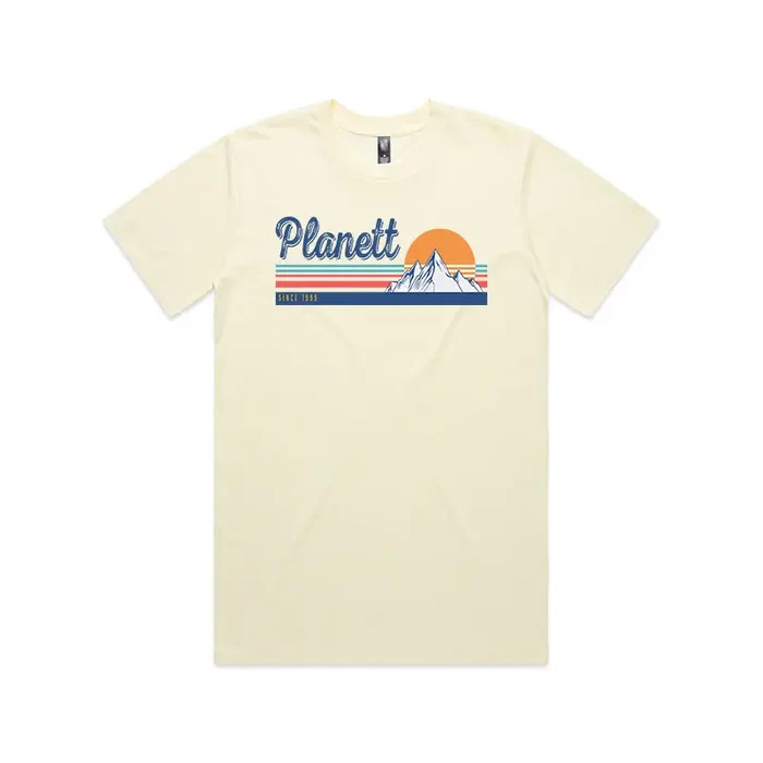 Cream-colored t-shirt with a mountain graphic.