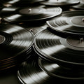 Stack of vinyl records with a close-up view