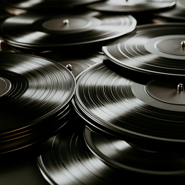 Stack of vinyl records with a close-up view