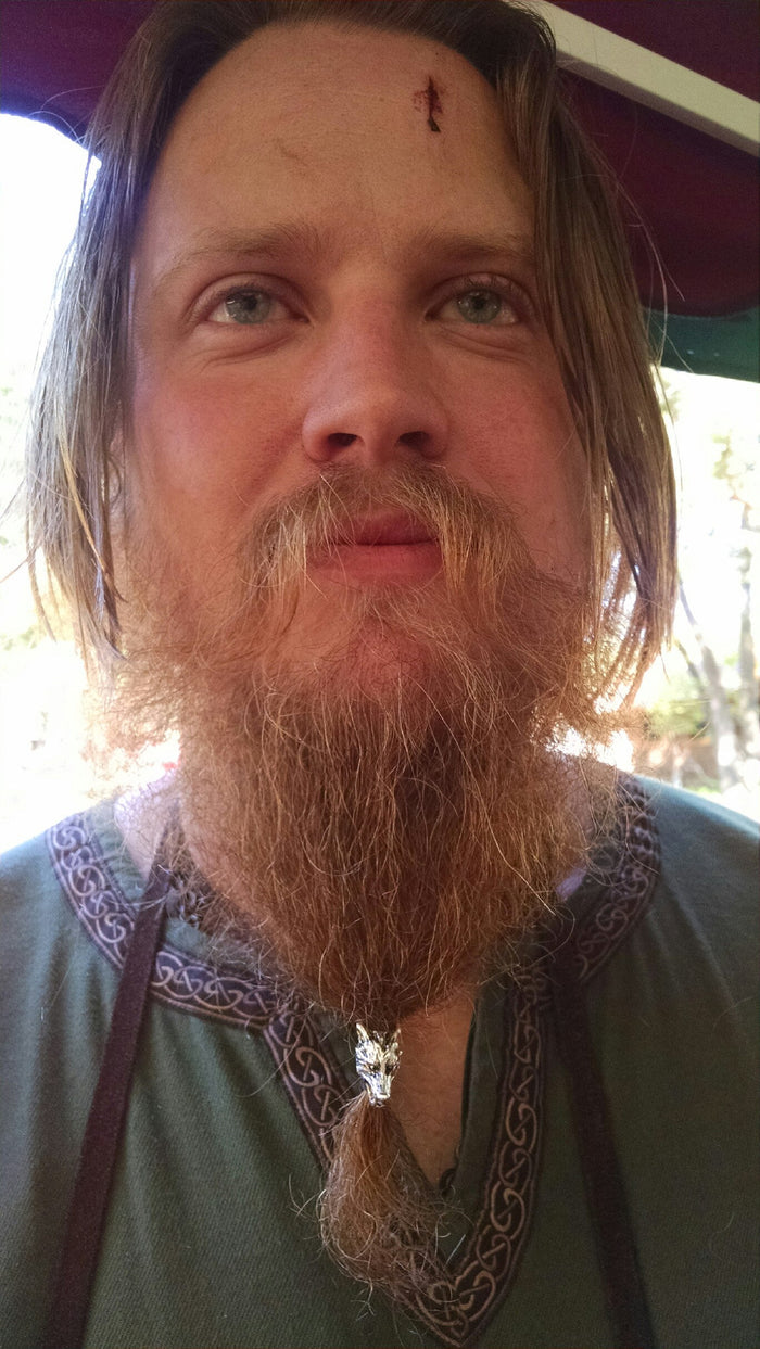 Model wearing Wolf's Head Hair Bead - Silver Finish Viking Braid Accessory