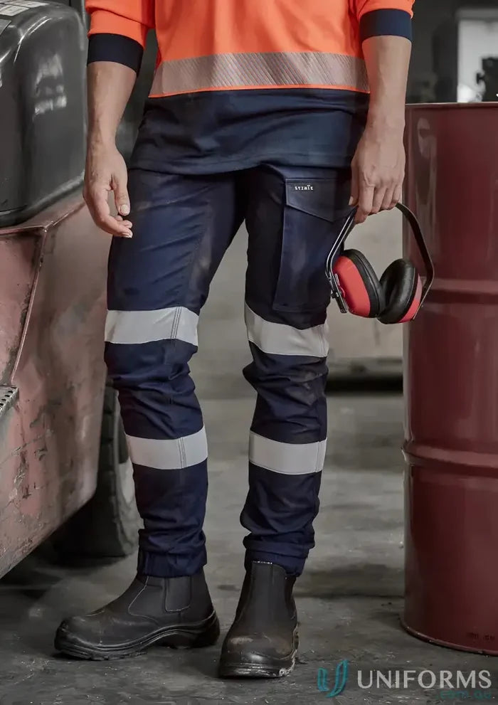 Workman in Women’s Essential Stretch Taped Cargo Pant with stretch reflective tape and boots